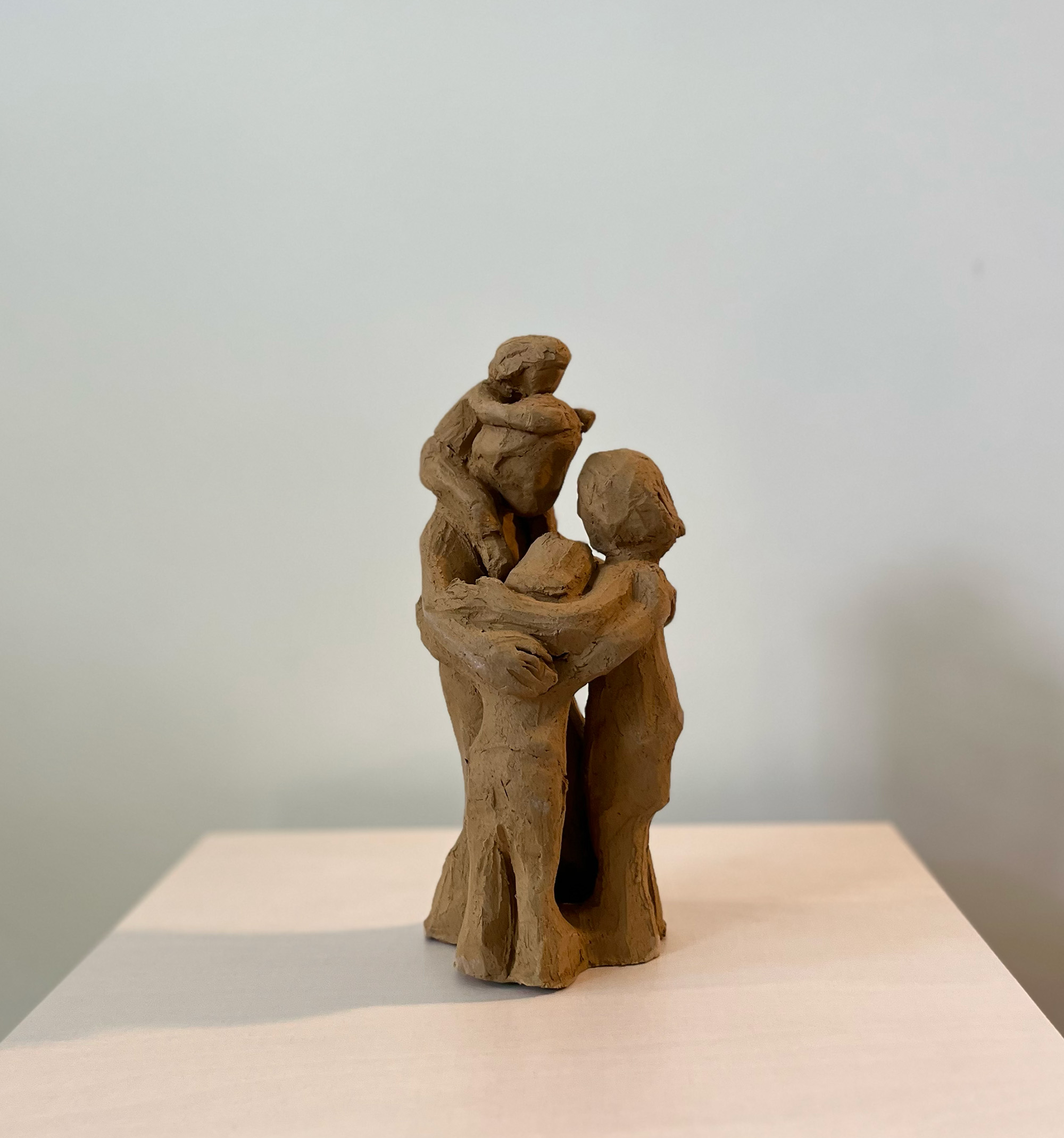 warm embrace-sculpture-clay